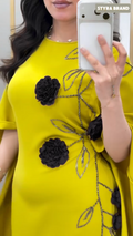 فستان نسائي فاخر بتفاصيل ورود – إطلالة تخطف الأنظار 👗💛